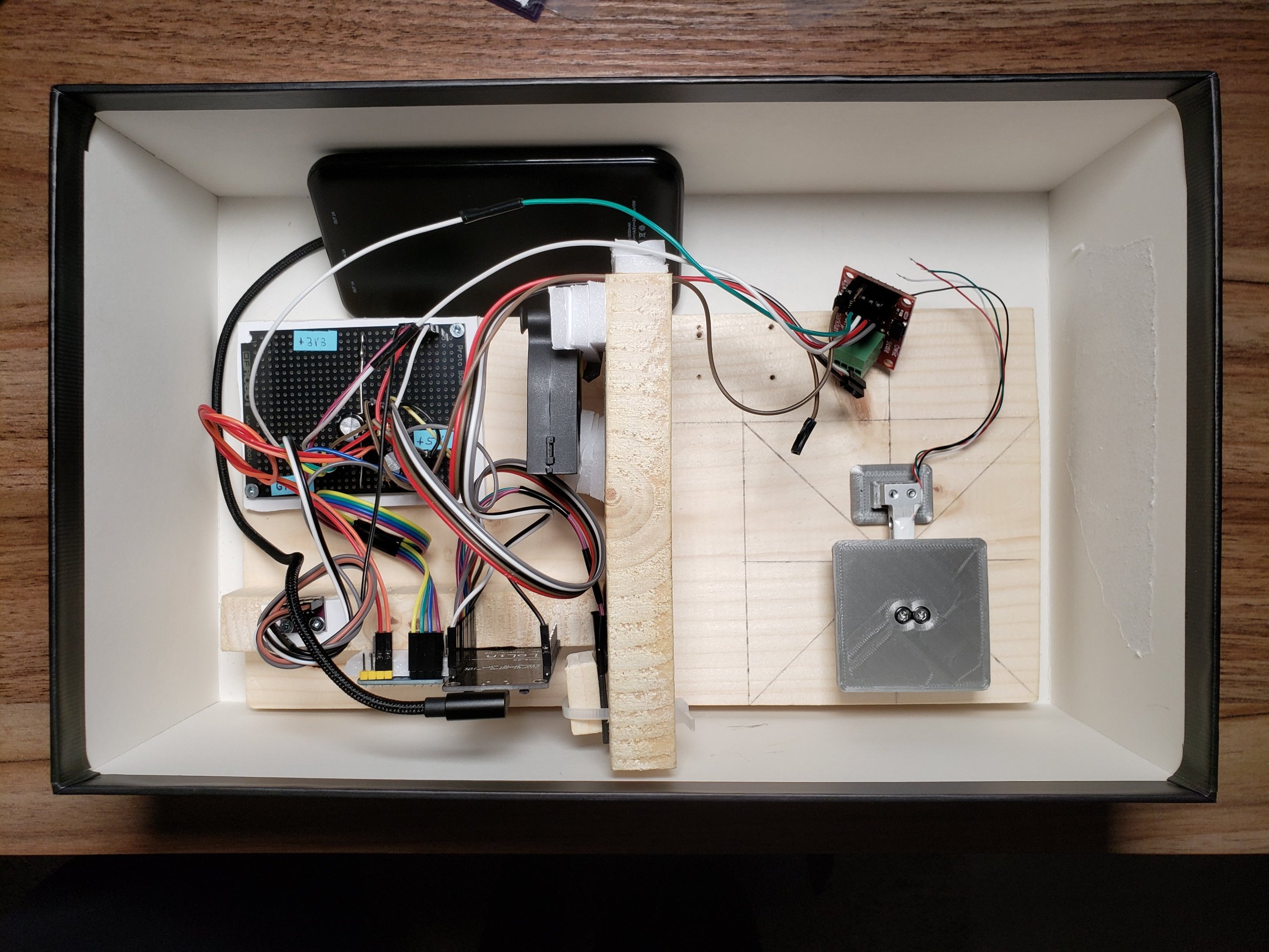Top view of the whole data logger. On the left majority of the electronics, on the right load cell with ADC (temporarily disconnected).